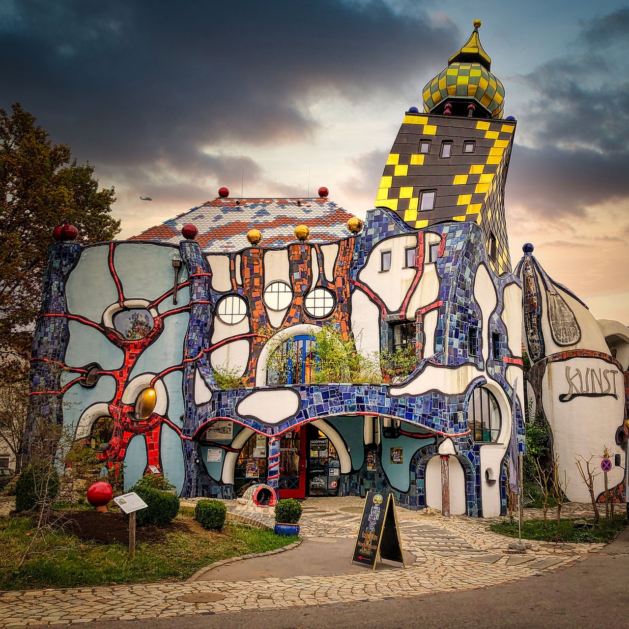 house, museum, hundertwasser, stones, pillar, tower, architecture, art, artist, stone, building, entrance, clouds, wall, portal, nature, house entrance, facade, ornament, abensberg