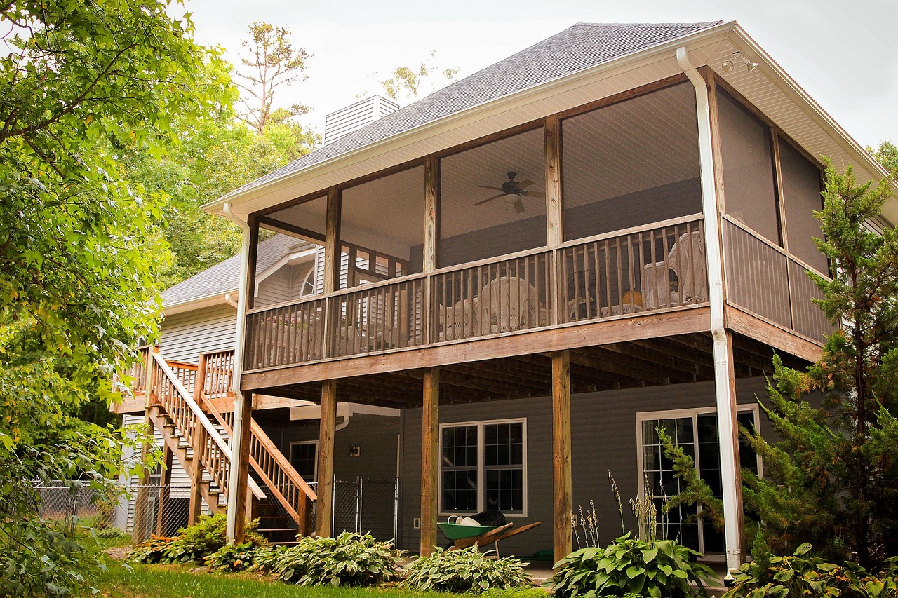 back porch, rear porch, back patio, rear patio, deck, backyard, rear elevation, house, home, hostas, staircase, stair, rear entrance, residence, screened porch, brown home, deck, deck, deck, deck, deck, backyard