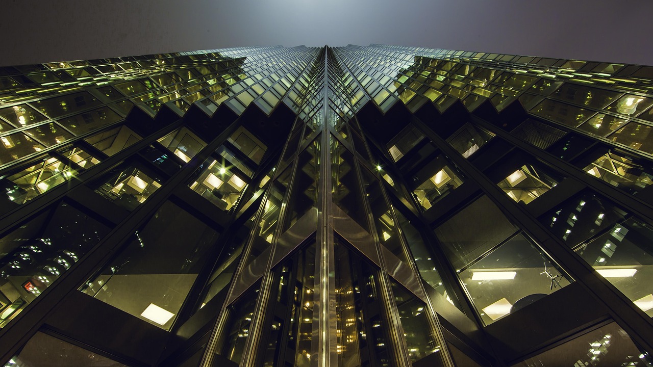 architecture, skyscraper, perspective, glass windows, symmetry, symmetrical, illuminated, facade, exterior, building, glass, modern, tower, urban, windows, high-rise, glass facade, symmetry, symmetry, symmetry, symmetry, symmetry, symmetrical