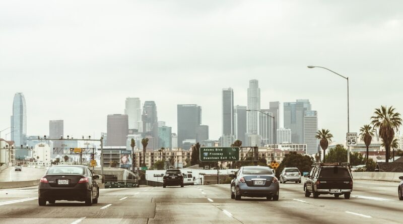 highway, cars, traffic, vehicles, towers, buildings, nature, skyscrapers, los angeles, downtown, center, freeway, office center, city, megalopolis, business centre, architecture, office, high-rise, multistory building, motion, road, asphalt, street, transport, sky, panorama