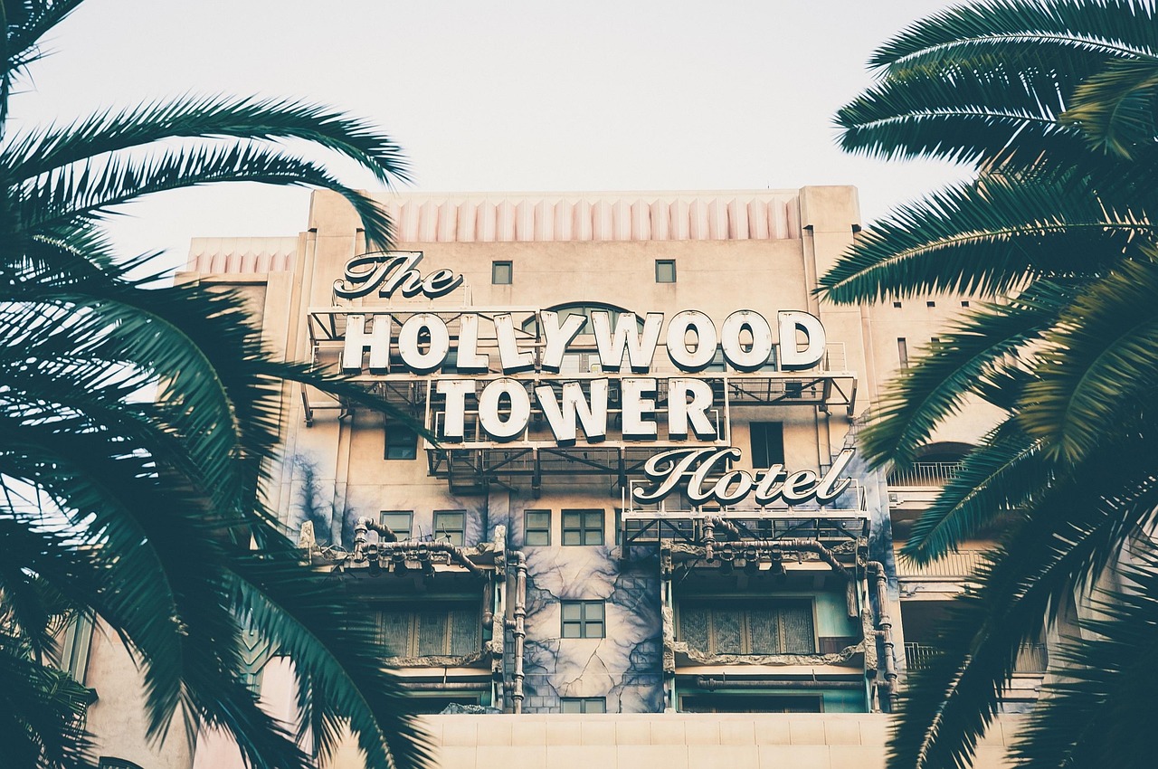 architecture, building, hotel, outdoors, palm trees, nature, the hollywood tower hotel, trees